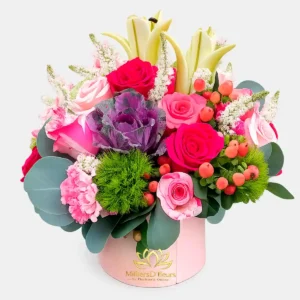 Box Resplandor con rosas fucsias y flores exóticas para envío a domicilio en Guayaquil.