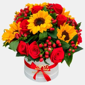Box floral con rosas rojas, girasoles y bayas rojas para envío a domicilio en Guayaquil - Milliers D'Fleurs.