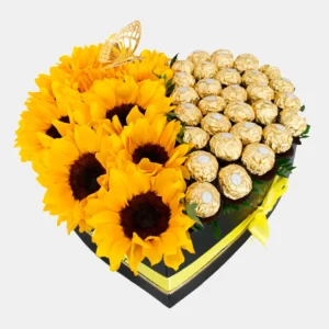 Arreglo floral de corazón con girasoles y chocolates Ferrero en Guayaquil.