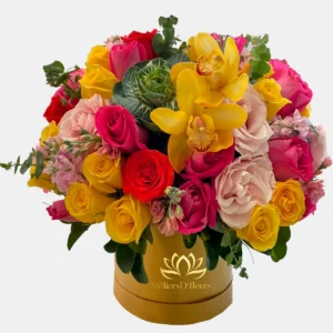 Arreglo floral premium con rosas y orquídeas en caja dorada MilliersD’fleurs Guayaquil.